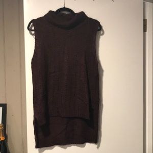 High/low sleeveless turtleneck sweater